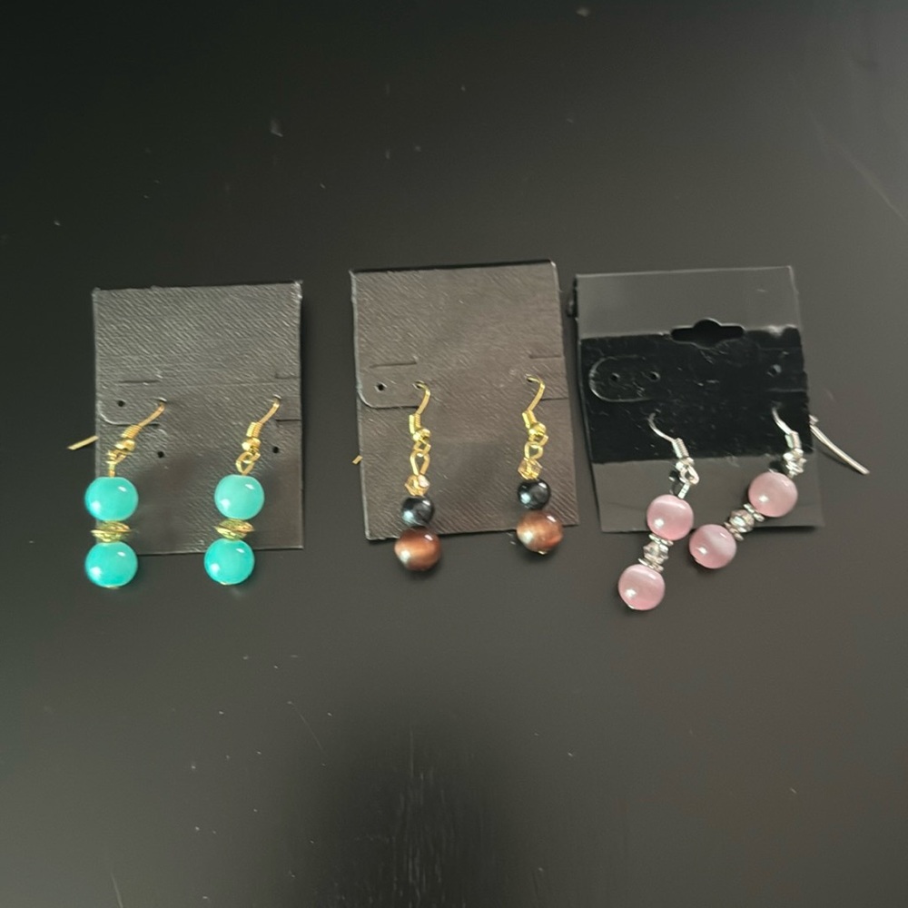 Bundle of Crafted Dangle earrings. Gold and Silver. Teal, pink and brown pair.